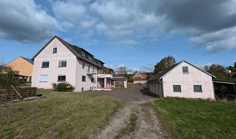 Detached apartment building on the outskirts of the village