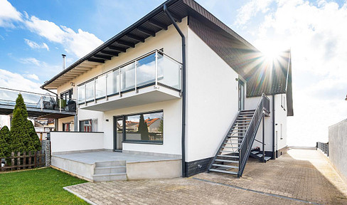 Core-renovated two-family house incl. heat pump: living, working & renting under one roof