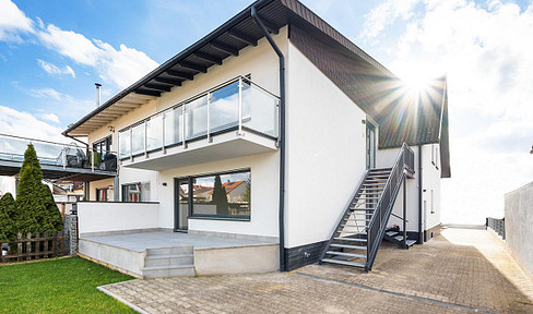 Core-renovated two-family house incl. heat pump: living, working & renting under one roof