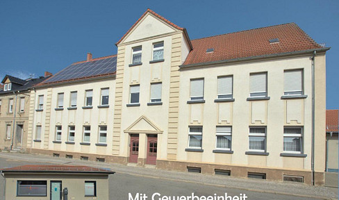 Multi-family house with stable rental income and development potential.