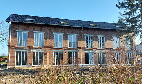 Newly built terraced house in Kummerfeld with garden