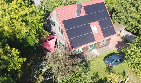 Energy-efficient detached house (energy class A+) made of wood with two building plots