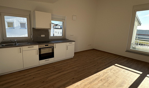 Modern 2-room apartment incl. modern fitted kitchen & parking space