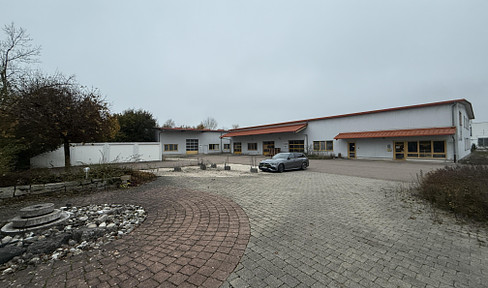 Spacious warehouse with heavy-duty shelving for versatile use