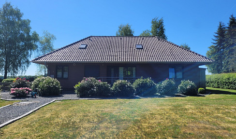 Detached house with barn, large garden and small adjoining wooded area for sale