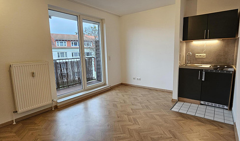 Stylish 1-room apartment with balcony in a central location