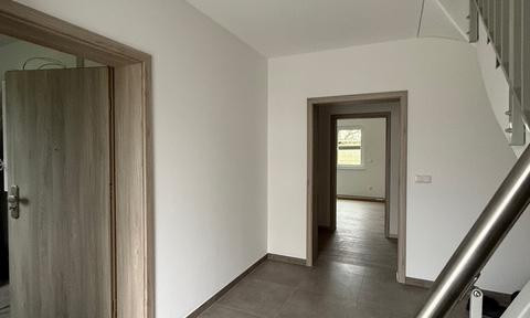 3 Zimmer Wohnung im Neubau mit Garten, Fussbodenheizung, Lüftungsanlage