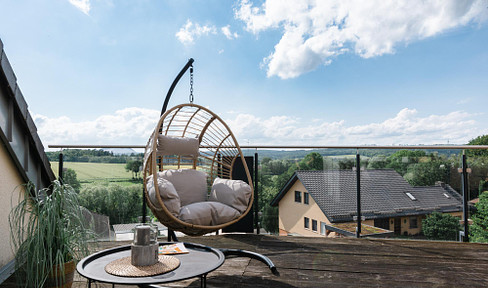 Exklusives Wohnen mit beeindruckender Panorama-Dachterrasse