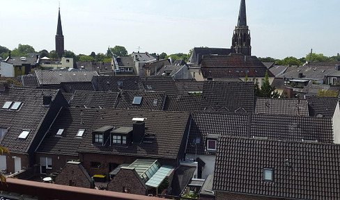 1-room apartment with new EBK above the rooftops of Moers