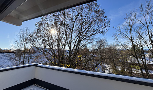 New-build penthouse in a prime location in Bad Aibling with a view of the countryside