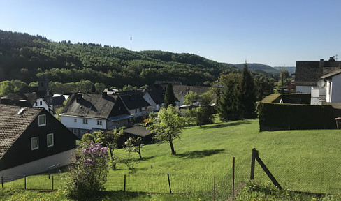 Two-family house with garden for sale