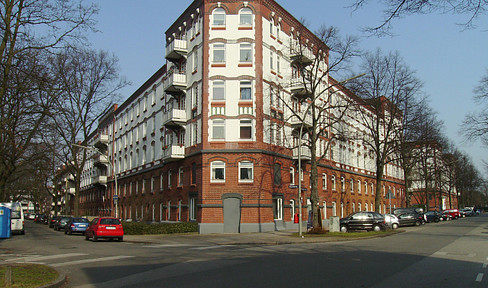 FURNISHED: Charming apartment in a historic building with a balcony overlooking greenery and a bright bathroom, centrally located and quiet.