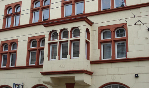 Spacious 2-room apartment in an old building with balcony