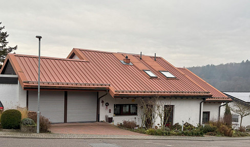 Individuelles Architektenhaus in einmaliger Aussichtslage Einfamilienhaus mit ELW