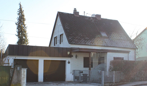 Detached house with double garage and large garden