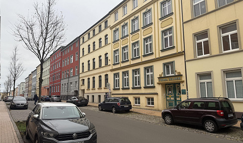 One-bedroom attic apartment with a balcony and a brand new fitted kitchen.