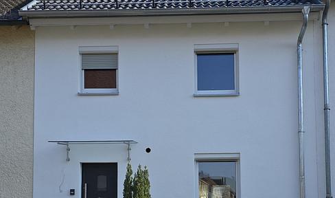 Core-renovated mid-terrace house - 100% renewable energies