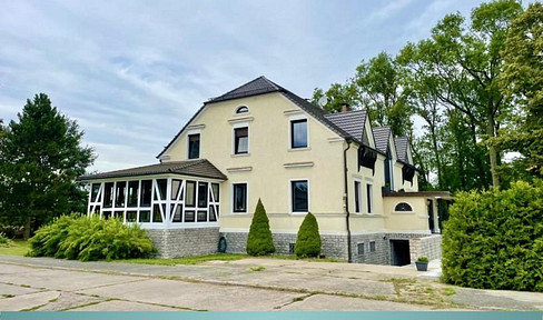 Wohn- und Geschäftshaus 730 m² mit großem Grundstück und Nebengebäuden