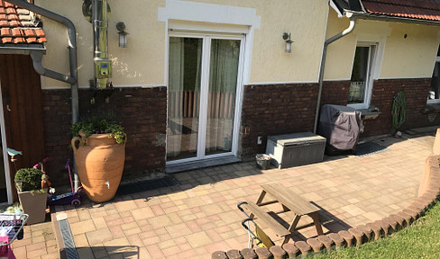 Terraced house with a garden, fireplace, and terrace – located in the Alt-Wetter district.