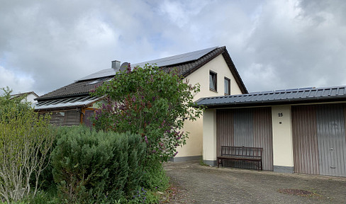 Detached house with beautiful garden and double garage