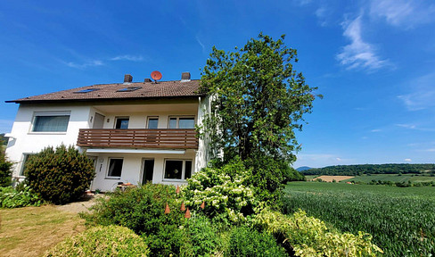 2-family house in the beautiful Leinebergland with far-reaching views // new heat pump