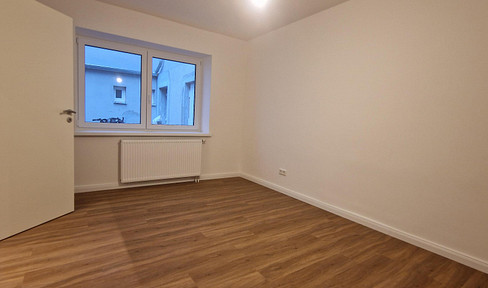 Freshly renovated 3-room ground floor apartment right in the center