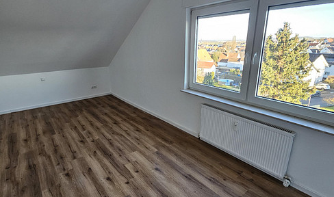 First occupancy after complete renovation 3-room apartment in Giessen with fantastic distant views