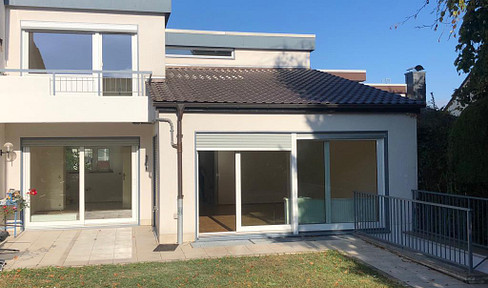 Modern mid-terraced house with mature garden