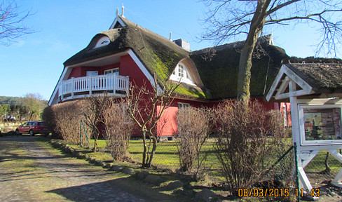 Vacation jewel under thatch in a tranquil fishing village