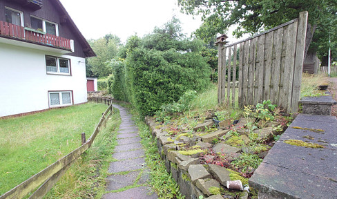 Gepflegte 2 Zimmer Wohnung mit Terrasse im Grünen  und optional mit Garage