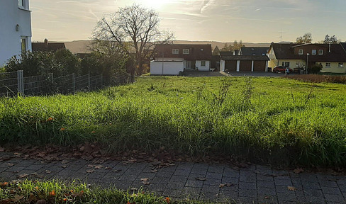 Sunny building plot with lake view