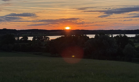 Modern single-family home with unobstructed views of the lake and mountains, located near Prien.