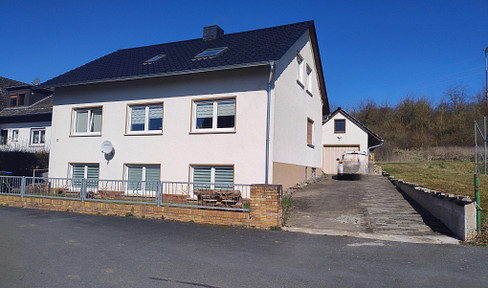 House with outbuilding
