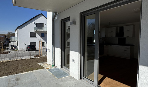 Sunny 4-room apartment // Garden, fitted kitchen and high ceilings // New build in Langenbach