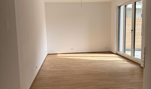 Moderne 2-Zimmer Wohnung mit Terrasse, EBK und TG Stellplatz - Erstbezug!