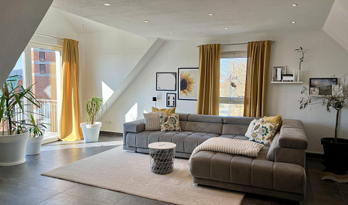 Moderne 4-Zimmer-Wohnung mit großzügigem Wohnbereich und Dachterrasse