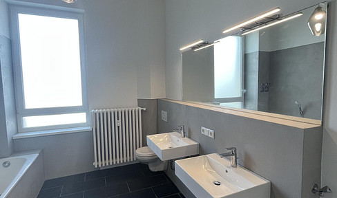 Generous. Stylish. Central. Newly modernized 4-room apartment in an old building near the clinic & BASF