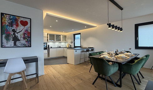 Exclusive penthouse apartment with a jacuzzi, offering excellent transport links to Basel – available for short-term rental, fully furnished.
