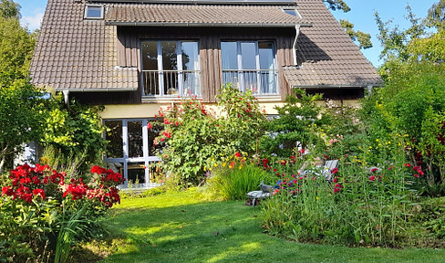 Detached single-family home within walking distance of the center
