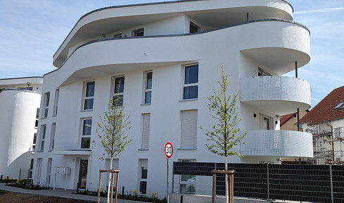 Stylish living with a garden: modern and bright 2.5-room new-build apartment in a quiet location