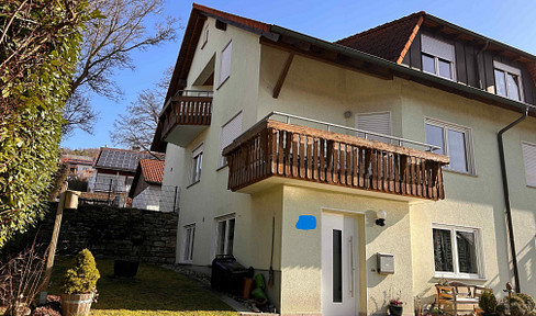 Beautiful detached house with a separate apartment and stunning views of the picturesque Tauber Valley, for sale.