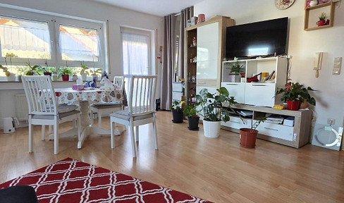 Partially furnished one-room apartment.