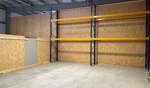 approx. 87m2 storage area incl. pallet high rack + 2 car parking spaces