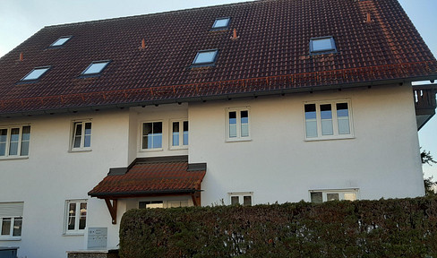 For sale by private individual: Bright 3-room apartment in the attic near Olching, with a balcony, underground parking, and within walking distance of the S3 train line.