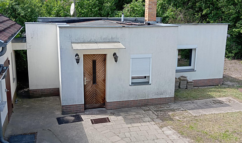 kleiner Bungalow 60 qm, sanierungsbedürftig auf sonnigem Grundstück