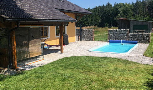 House in a dream location with grassland and forest