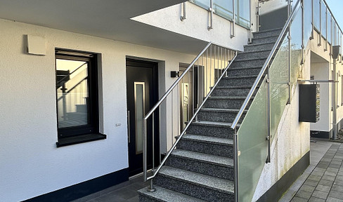 Modern 2-room apartment with terrace & underground parking garage