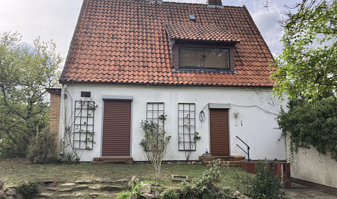 Sanierungsbedürftiges Siedlungshaus in zentraler Lage in Adendorf