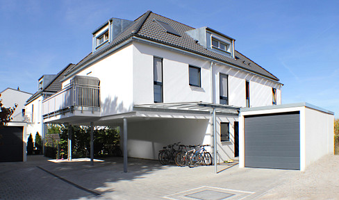 5 townhouses with 2 garages and 3 parking spaces
