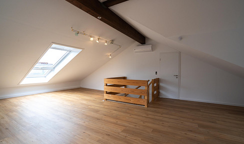 Renovated 3-room maisonette with south-facing balcony